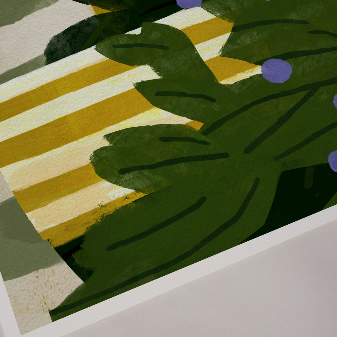 Close-up of green leaves on a striped fabric background