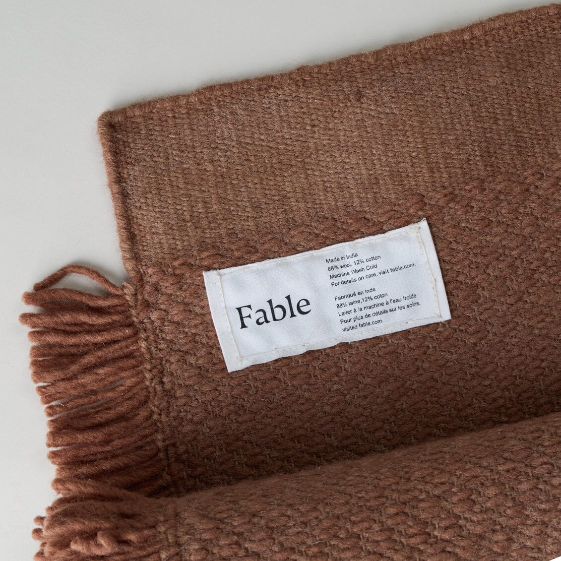 Brown fabric with a 'Fable' label on a light gray background #sunsettan
